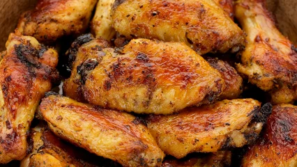 Poster Restaurant Fry chicken wings close up  © Евгений Логвиненко