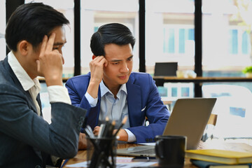 Exhausted businessmen frustrated by business problem or dissatisfied with work results