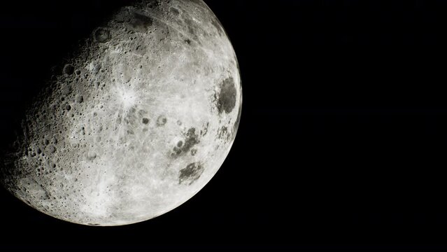 view of the partially sunlit moon from space