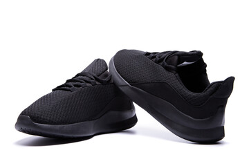 athletic lightweight black sneakers insulated on a white background isolate