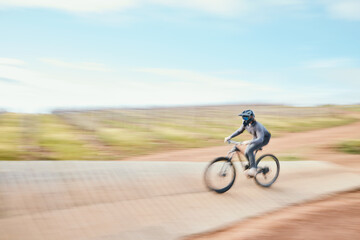 Obraz premium Motorbike, speed and freedom in desert with adventure for sport in competition or blur. Race, dirt bike and action with energy in outdoor for training or rally performance with power in mockup space.