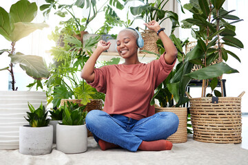 Music, dance and radio with a black woman in her home by plants while streaming an audio playlist....