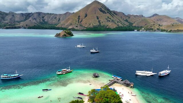 Komodo islands drone view. Exotic travel destination in Indonesia. Tropical summer holiday. Cruise boat vacation. Cinematic drone flight Flores, Indonesia