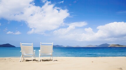 Fototapeta na wymiar two sun chairs on beach on a sunny cloudy day