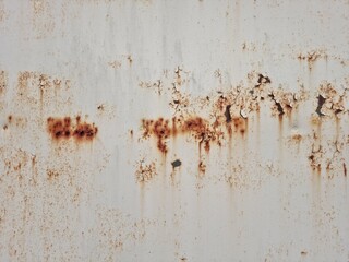 old rusted metal wall section on abandoned building