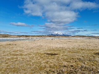 heavy cloud cover over the Dønnamannen mountain seen from the Herøy island