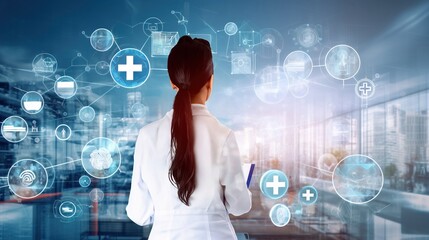 a nurse / doctor taking note while walking through the hospital / healthcare center lobby with biological and physical technology bubble concept