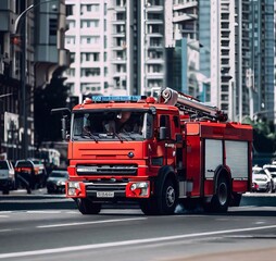 Fototapeta na wymiar fire truck in the city
