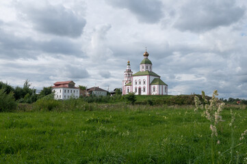 16,08,2020 Russia Suzdal city view, ancient churches against the backdrop of green meadows and blue sky. High quality photo