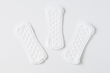 Feminine hygiene protection pad for woman critical days on white