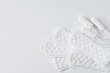 Feminine hygiene protection pads and tampons for woman critical days on white background