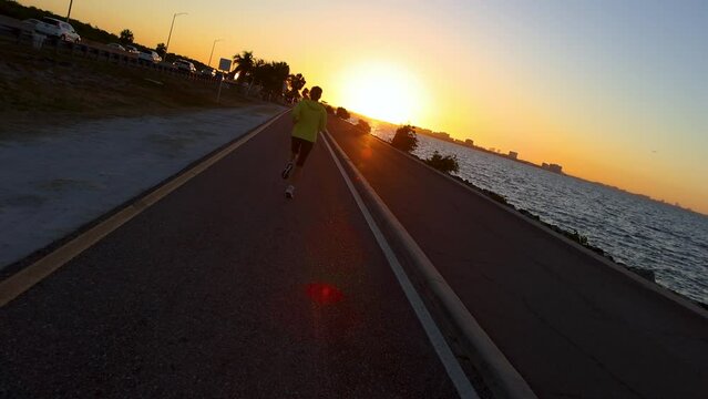POV woman doing healthy exercise at sunrise Tampa Florida