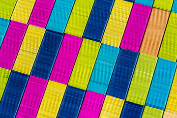 Multicolored office metal staples background