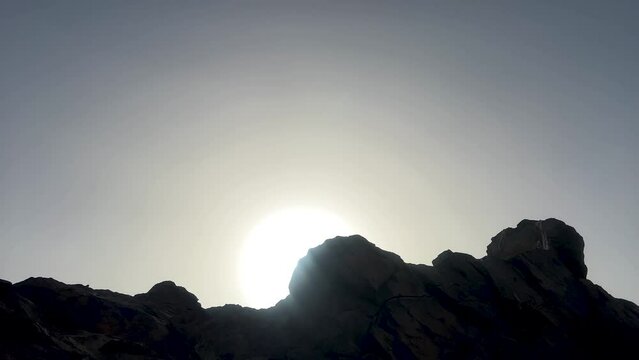 View of the magnificent sand dunes with small mountains from the top at day time. Diffused natural beautiful lighting of sandy hills. desert top view
