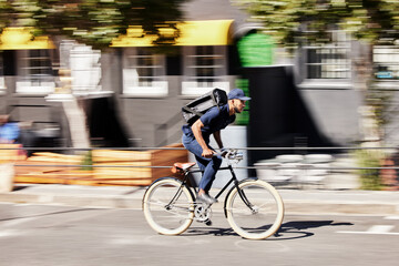 Delivery, man or motion blur on bike in city for quick logistics, service or fast food order....