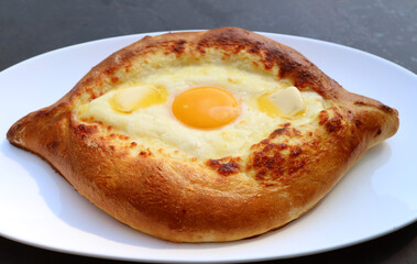 Closeup of Delectable Adjaruli Khachapuri, a Traditional Georgian Cheese and Egg Bread