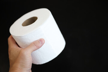 roll of toilet paper on a clean, white background, symbolizing comfort, hygiene, and the everyday essentials of modern life