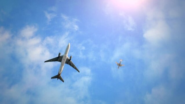 Flying airplanes in blue sky with clouds, motion promotion, summer and travel style background