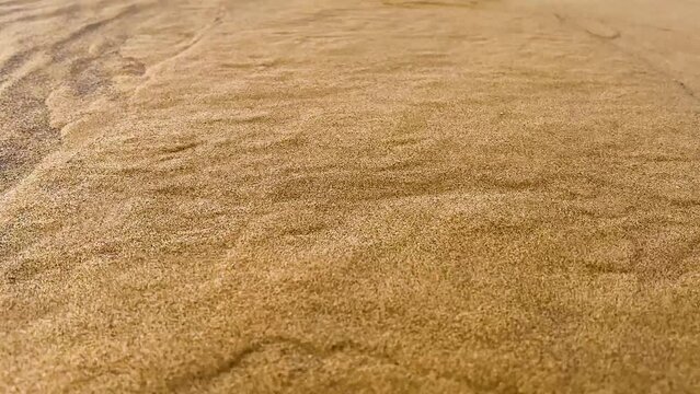 View of the magnificent sand dunes with small mountains from the top at day time. Diffused natural beautiful lighting of sandy hills. desert top view