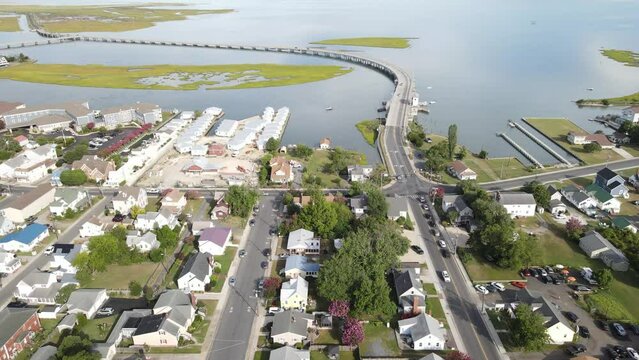 Road through the swamps to the Chincoteague bay nature reserve. Aerial view of the road and the reserve