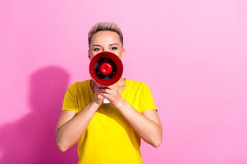 Fototapeta premium Portrait of pretty lady hands hold loudspeaker communicate empty space ad proposition isolated on pink color background