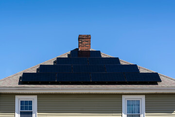 solar panels installed on a house roof top, Brighton, USA