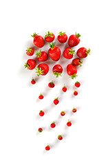 Cloud and rain from strawberries on a white background. Vertical orientation, top view.