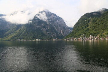 Photo of a lakeside village surrounded by nature, Austria