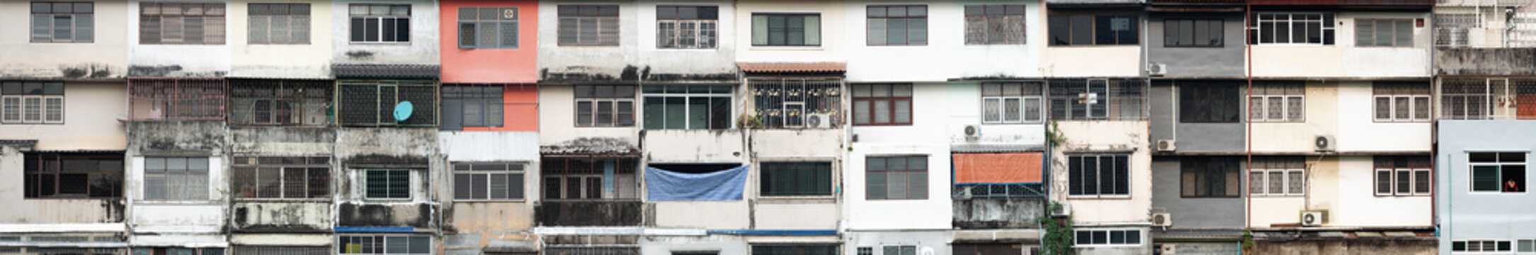Faded house facade of the poor inhabitants ghettos