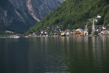 Photo of a lakeside village surrounded by nature, Austria