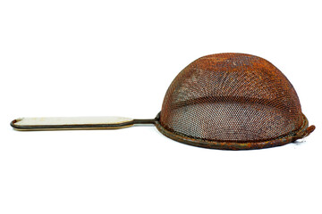 A used rusty broken sieve isolated on a white background.