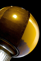 A Close Up Of A Yellow Object On A Black Background