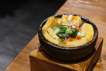 cooked juicy tofu cuisine on dinner table. Chinese food