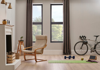 Sport in the home concept with bike and mat, wall chair and room interior style.