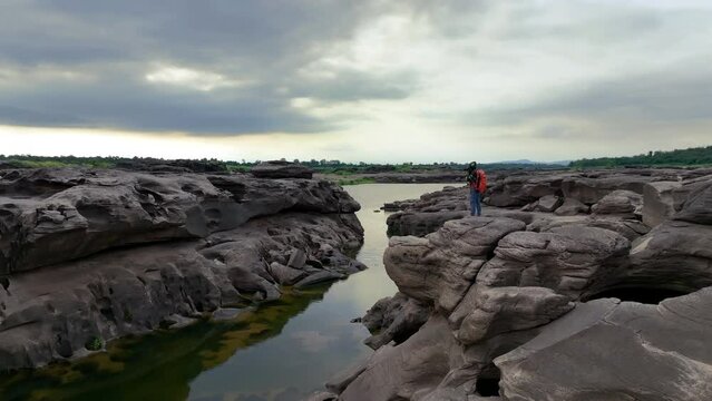 Tourist visiting at Sam Phan Bok in Ubon ratchathani, Thailand. Grand canyon of Thailand.