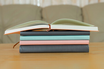Books stack on the wooden chair for business, education back to school concept.