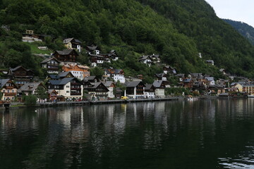 Austria's Scenic Village Enveloped by Majestic Mountains and a Sparkling Lake