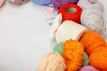 A set of colorful clew of thread for knitting and special craft tools. Handmade, hobby concept