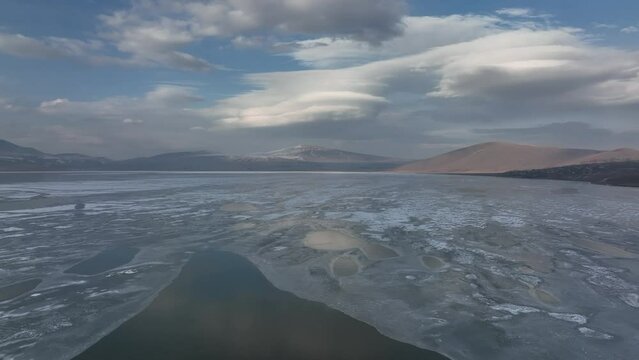 Aerial view of frozen Lake Paravani. The largest lake in Georgia at an altitude of more than 2000 meters.