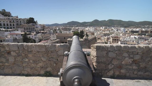 Cannon and Dalt Vila old town from Bastion, UNESCO World Heritage Site, Ibiza Town, Ibiza, Balearic Islands, Spain