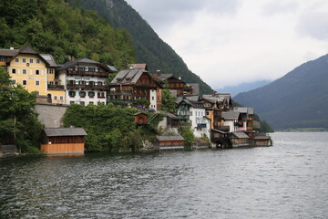 Naklejka premium A row of wooden houses on a mountain side, Austria