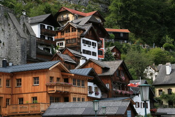 A row of wooden houses on a mountain side, Austria