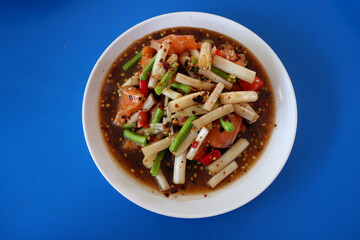 Papaya salad with lotus flow.