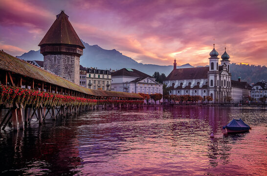 Fantactic colrful picture on Old Town medieval architecture in Lucerne, Vivid nature scenery of lake Lucerne during sunset. Switzerland. Beautiful historic city center, popular travel destination.