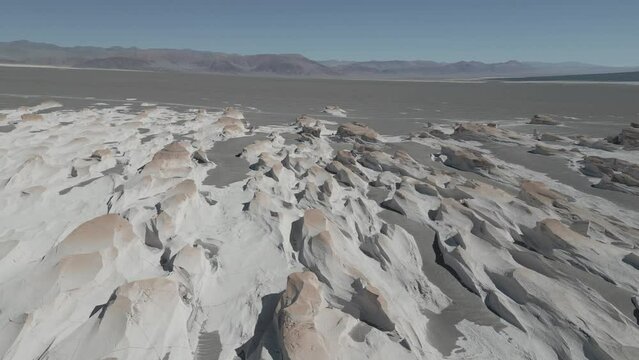 Drone footage of Campo de Piedra Pomez - a bizarre but beautiful landscape in the Argentinian highlands with a huge field of pumice, volcanic rocks and dunes of sand in the Puna - raw version