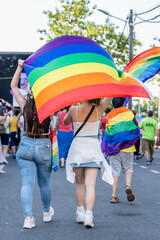 homosexual couple with a pride flag