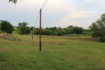 Fototapeta na wymiar A power lines in a field