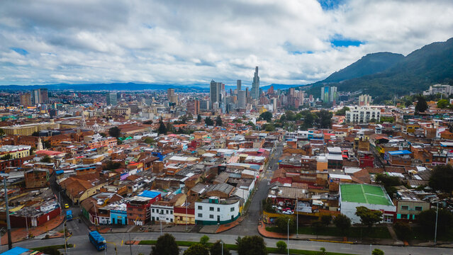 High-rise buildings and city sprawl of Bogota Colombia with Mountain In Background