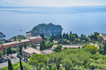 View of the blue sea from a beautiful mediterranean garden park in Taormina, Sicily, Italy - obrazy, fototapety, plakaty