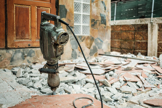jack hammer machine break concrete floor for renovation